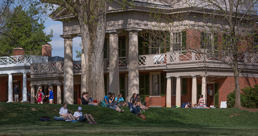 UVA students sitting on the Lawn