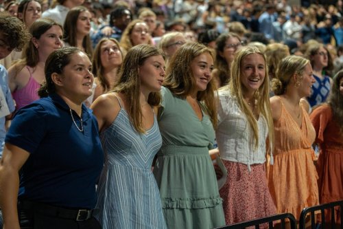 Students together singing the Good Old Song at Convocation
