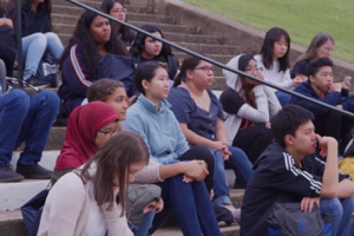 Students on the steps of the ampitheatre