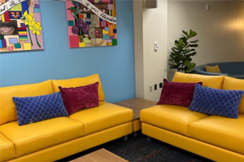 Hoos First Center with yellow couches and blue walls